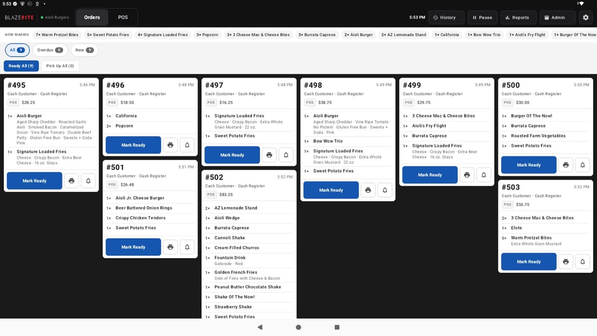 The BlazeBite kitchen screen with open order tickets and Mark Ready buttons