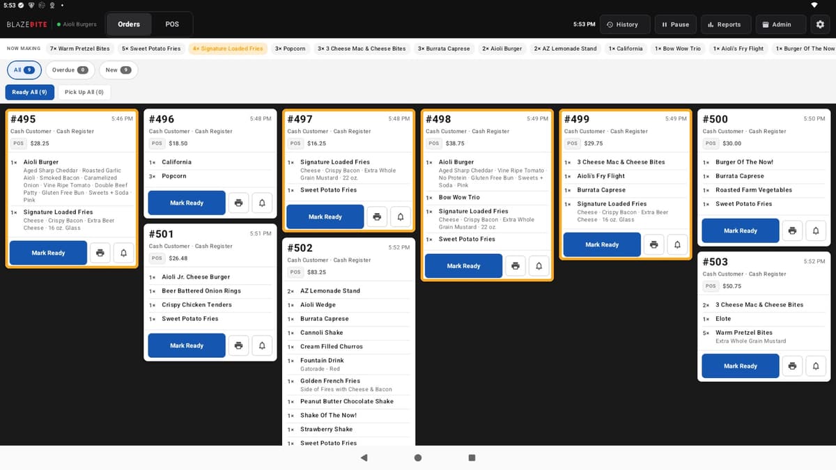 The BlazeBite kitchen screen with open order tickets, each listing the items and a Mark Ready button