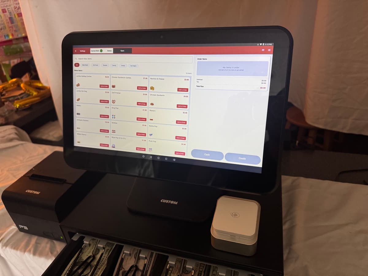 A BlazeBite terminal with the cash drawer open