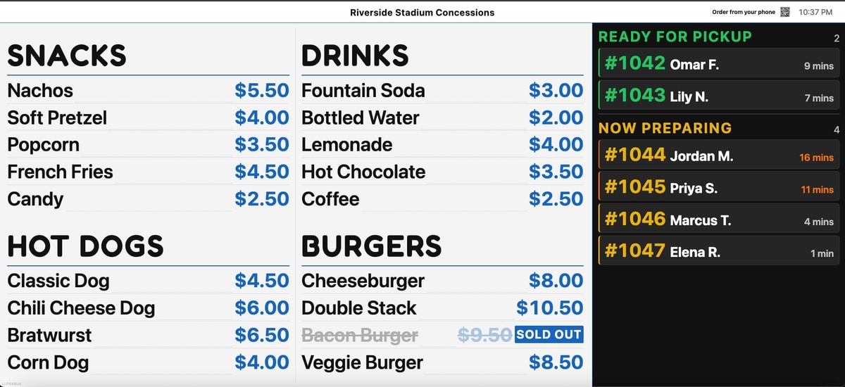A BlazeBite board with snacks, drinks, hot dogs, and burgers in two columns with prices, one item struck through and marked sold out, and a dark column on the right listing orders ready for pickup and now preparing