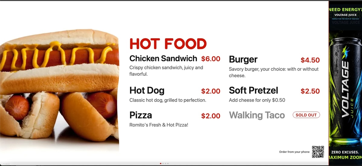 A BlazeBite board with a photo of a hot dog beside the hot food menu and a tall sponsor ad for an energy drink down the right side
