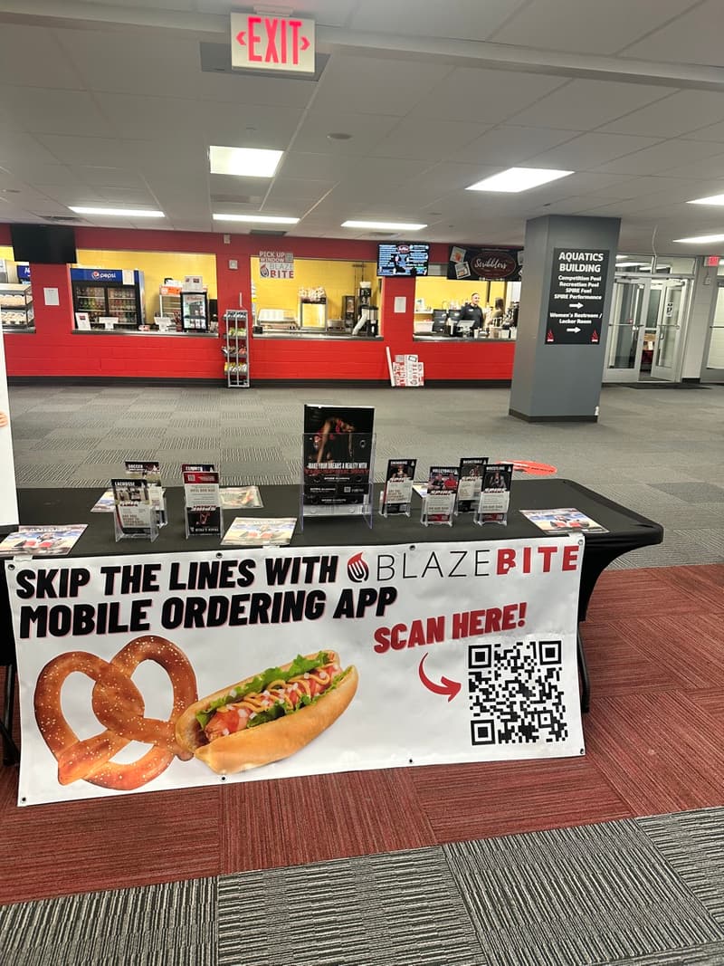 The concession counter at Spire with a BlazeBite ordering table set up in front of it